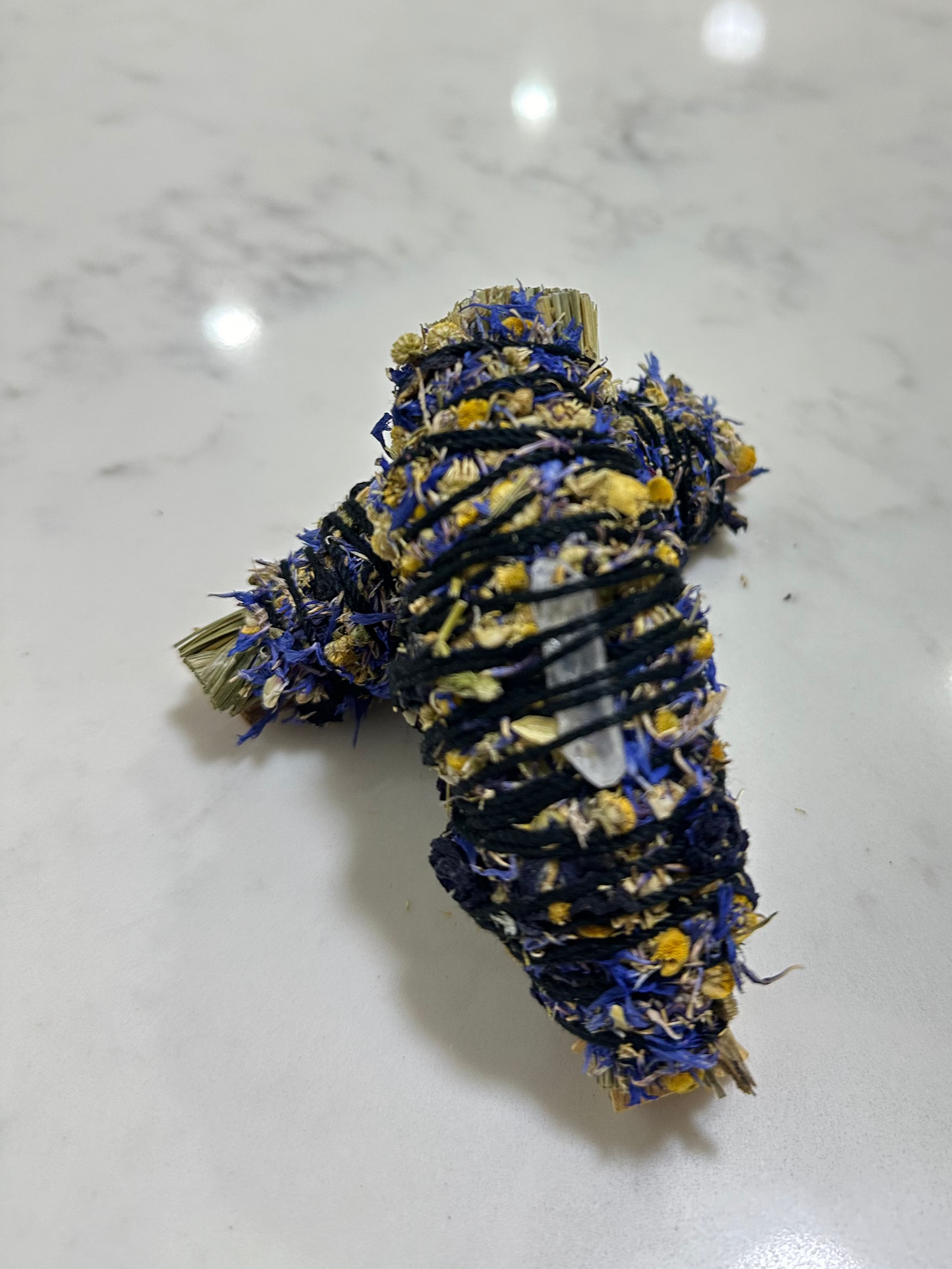 Sage smudge stick bundle with flowers and crystal. Gifting and housewarming. 